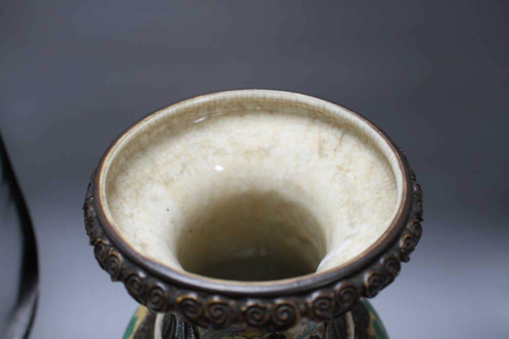 A late 19th century Chinese crackle glaze vase, decorated with figures in a continuous landscape, height 46cm